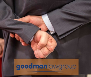 lawyer with fist clenched