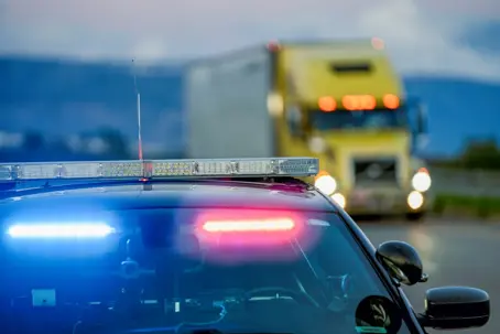Police officer pulled over a semi truck suspecting the driver was drunk